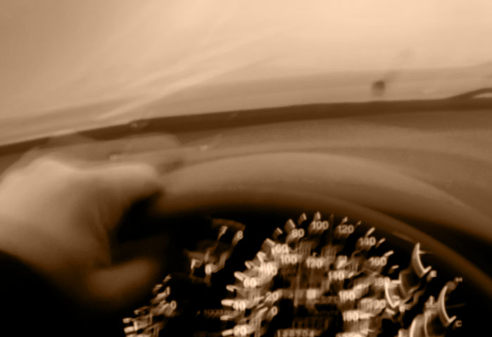 hands blurred on wheel - driving